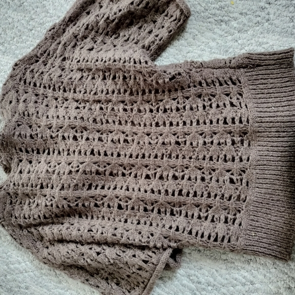 This is a Free People Pointelle Open Knit Alpaca Hooded Sweater in brown. Small - Picture 11 of 13